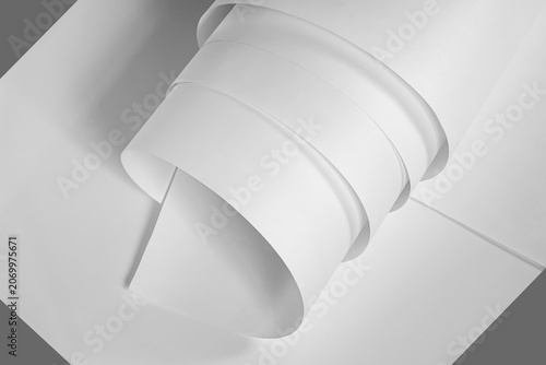 A roll of white paper in black and white.