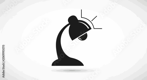 Minimalist Silhouette of a Desk Lamp Illuminated on a Solid White Background