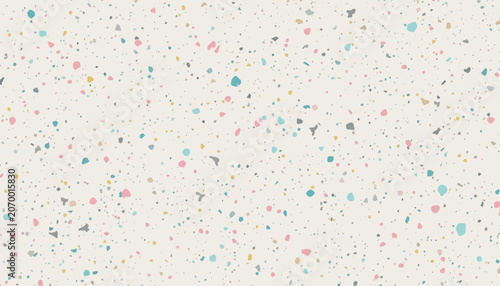 Charming speckled pattern with pastel specks on a light background, perfect for playful design.
