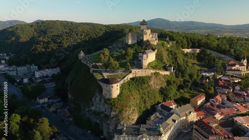 Drone Shot of Trenčín Castle Overlooking the City, Mountains and Green Landscape
