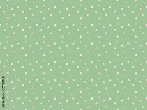 dots flower as seamless pattern on green background