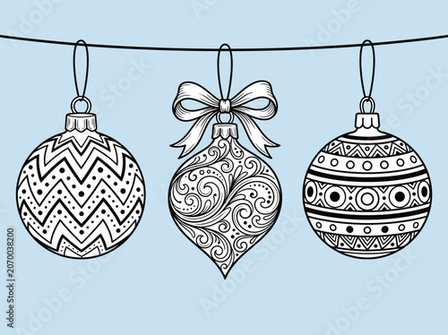 Three Detailed Christmas Ornaments Hanging on a Line in Black and White