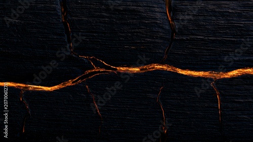 Tapety artystyczne Dramatic charred wood texture reveals glowing cracks a study of resilient beauty and raw elemental power