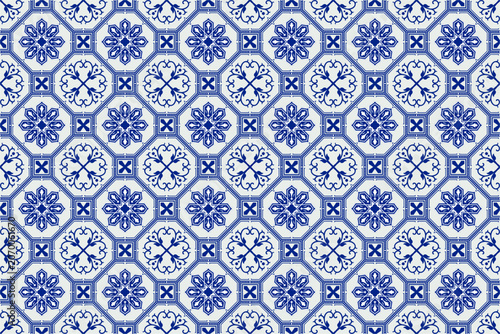 Traditional blue white seamless floral ceramic tile pattern with repeating geometric motif and vintage porcelain ornament design