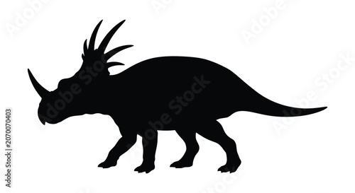 A triceratops dinosaur in side profile a black silhouette against a white background prehistoric reptile extinct paleontology paleozoic