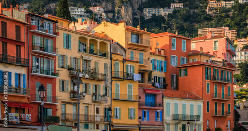 Seaside promenade with colorful restaurants along the Mediterranean Sea in Villefranche sur Mer Old Town, Villefranche-sur-Mer, France
