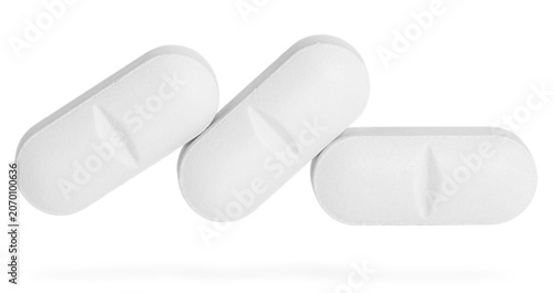Принти на полотні Different pills in row isolated on white