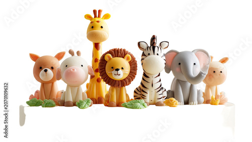 cute animal figurines collection arranged on cake decoration safari theme birthday celebration isolated on white background 