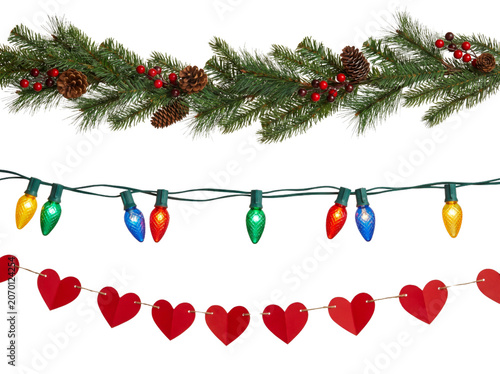 Vertical elements of pine branch garland multicolored lamp string and red heart banner isolated on transparent background.