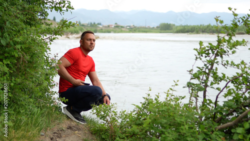 Bild auf Leinwand A man is traveling in the Altai Mountains