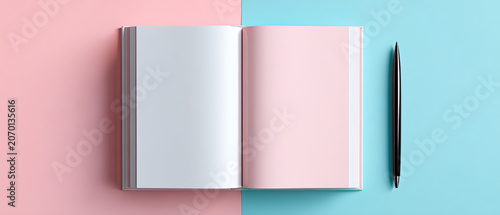Minimalist flat lay of an open blank notebook with a black pen on a split pastel pink and blue background, ideal for creative and educational concepts.