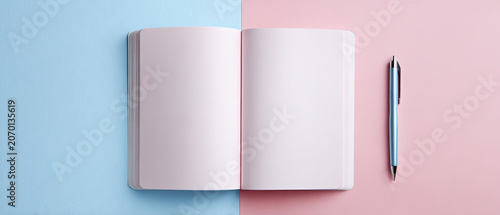 Blank open notebook centered on pastel blue and pink background, with pen, ideal for education, creativity, planning, and design concepts.