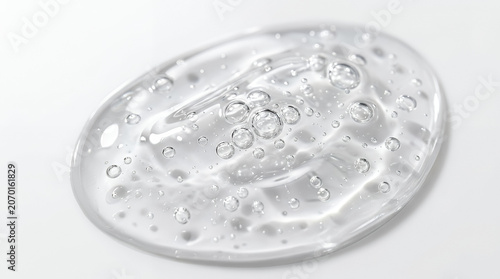Clear gel with bubbles on a white background, skincare product concept