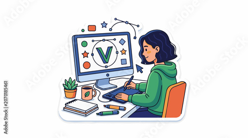 A woman in a green hoodie works on a computer with a graphics tablet