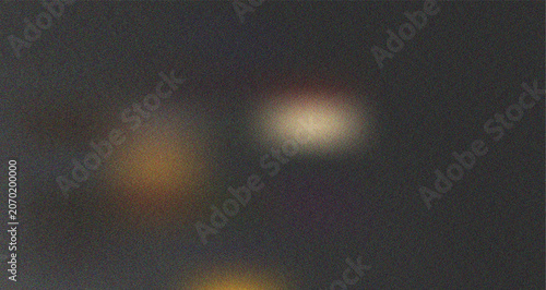 Photos Mysterious dark abstract surface featuring subtle blurred lights and fine granul