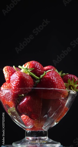 Red ripe strawberries laid out on a dessert plate. Fruit dessert. Natural vitamins.