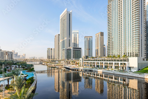 Scenic waterfront view at Dubai Creek Harbour with modern skyline, promenades and landscaped public areas attracting visitors and residents