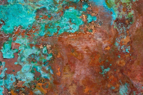Obraz na plátně Weathered copper patina texture with turquoise oxidation and rusted metal surface