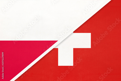 Poland and Switzerland national flags on fabric background, international partnership and cooperation between two countries