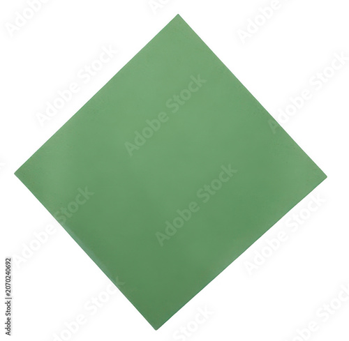 A single sage green square tilted diagonally against a solid black background