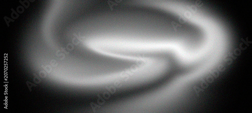 Fotografie Abstract smooth white smoke shapes flowing against deep black background creatin