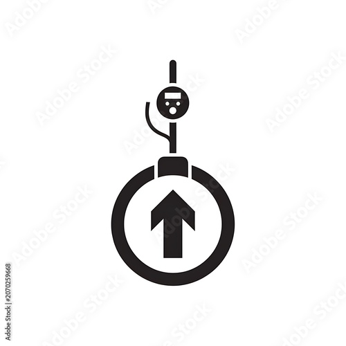 Black and white pedestrian crossing sign with arrow.