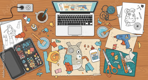 Creative workspace with art supplies and laptop on wooden desk