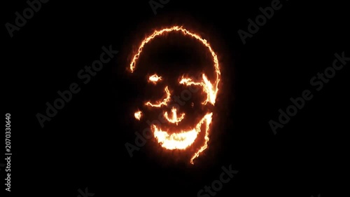 The appearance of a fiery skull on a black background. 4K