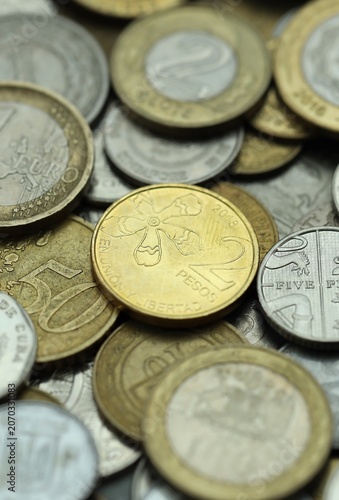 Photography Big heap of coins from various different money currencies
