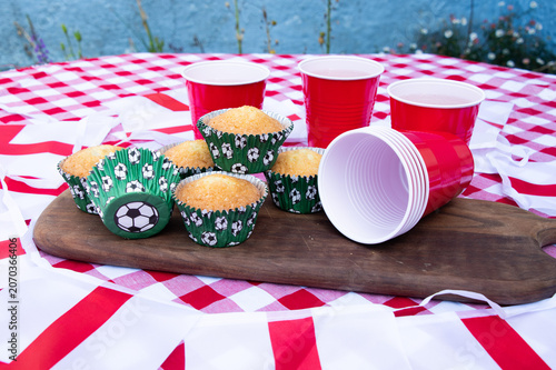 Get ready for the big match with a festive football party filled with delicious cakes, colourful red, white and blue bunting, and plenty of team spirit. Friends and family gather to celebrate, enjoy t