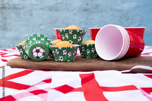 Get ready for the big match with a festive football party filled with delicious cakes, colourful red, white and blue bunting, and plenty of team spirit. Friends and family gather to celebrate, enjoy t