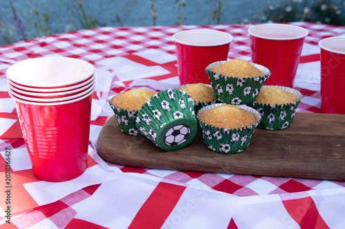 Get ready for the big match with a festive football party filled with delicious cakes, colourful red, white and blue bunting, and plenty of team spirit. Friends and family gather to celebrate, enjoy t