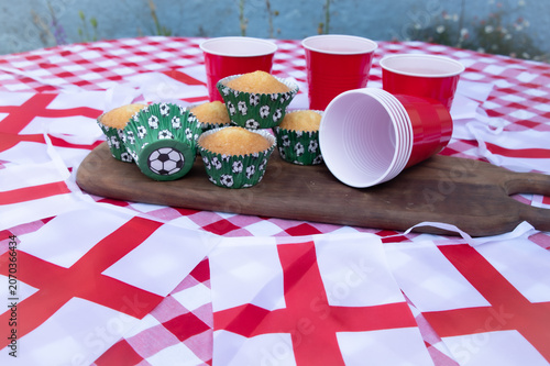 Get ready for the big match with a festive football party filled with delicious cakes, colourful red, white and blue bunting, and plenty of team spirit. Friends and family gather to celebrate, enjoy t