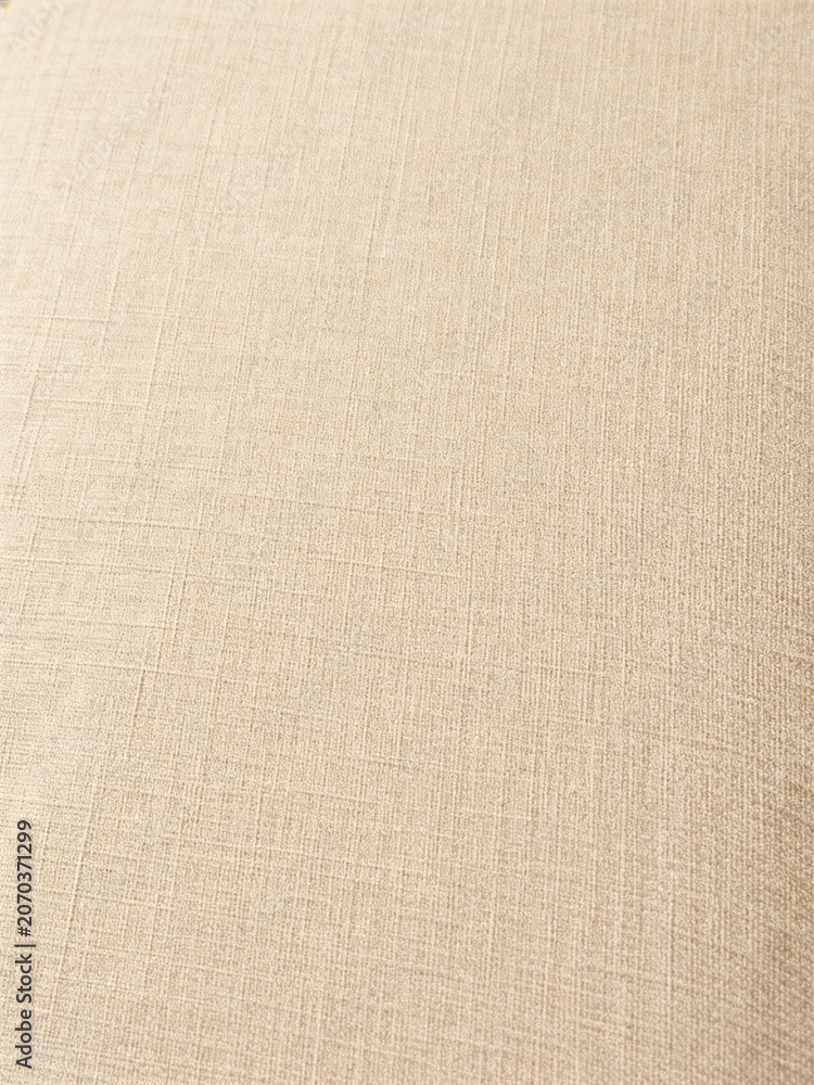 Fototapeta premium Close-up of Beige Fabric Texture with Soft Lighting