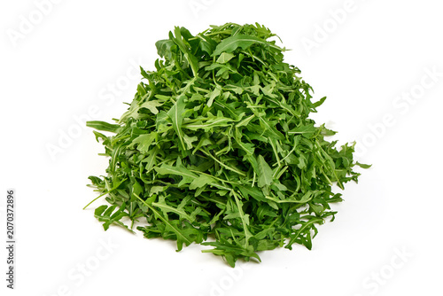 Schilderij op canvas Fresh Arugula Leaves on White Background