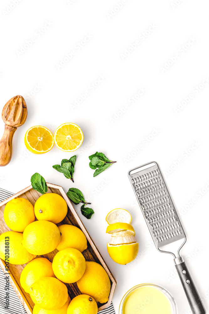 Fototapeta premium healthy sweet curd cooking with lemons on kitchen white background top view mock up