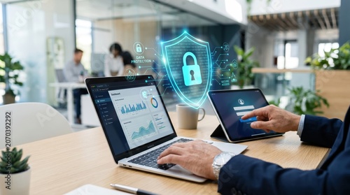 Businessman managing data protection and secure access with futuristic cybersecurity shield technology.