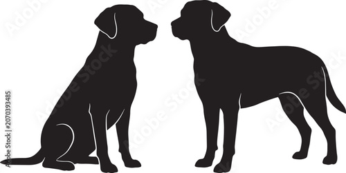 Silhouettes of sitting and standing labrador retriever dogs facing each other in profile view as black animal shapes on transparent layers.