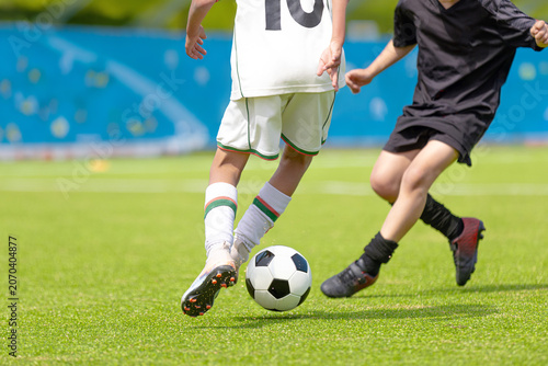 Photography Football Soccer Action Shot: Close-Up of Players Dribbling and Defending Ball on