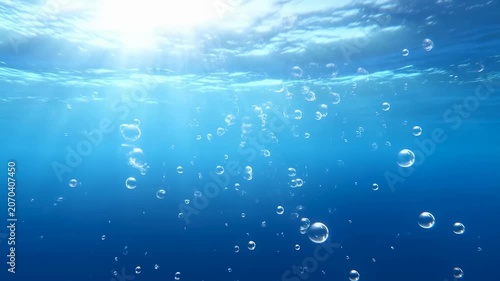 Underwater scene with sunlight filtering through water, creating a serene atmosphere with bubbles rising. Represents tranquility and the beauty of aquatic environments