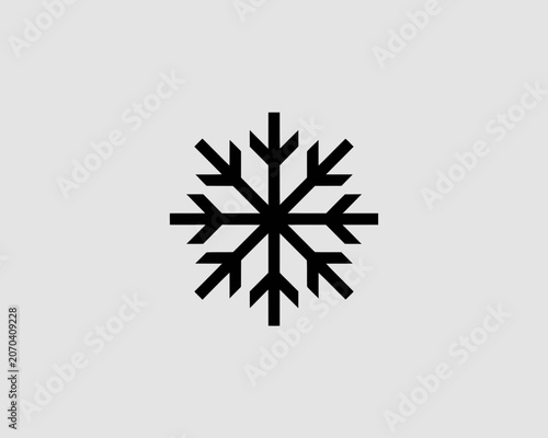 Minimalist black snowflake icon symbol isolated on a light gray background