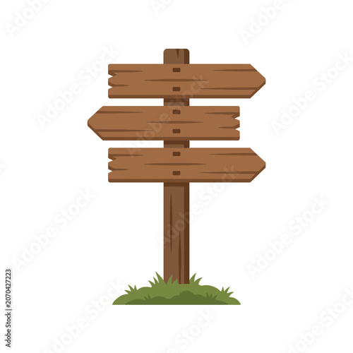 A rustic wooden directional signpost stands on green grass