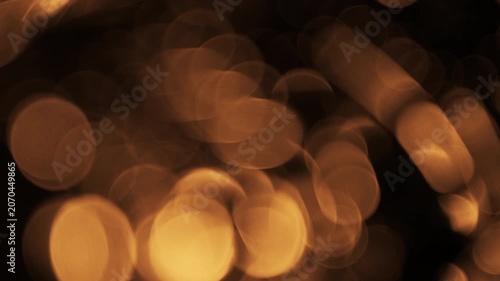 Warm golden light leak bokeh lens flare transition overlay with soft glow