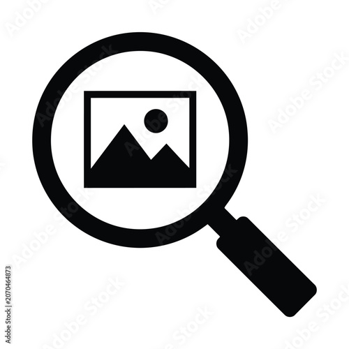 Magnifying glass with mountain and sun icon inside
