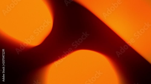 Cinematic Glowing Warm Orange Fluid Gradient Motion Abstract Background. 4K
