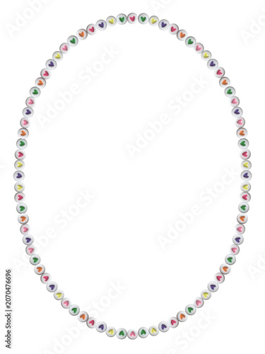 Decorative oval frame made from real heart beads in assorted pastel colors. Colorful acrylic beads arranged in a clean border composition and isolated on a black background with handcrafted jewelry an