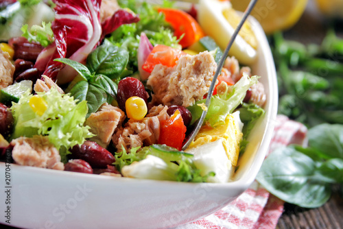 Tableau sur toile Fresh Tuna and Egg Salad on wooden background