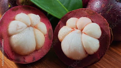 Fresh mangosteen on a wooden floor.