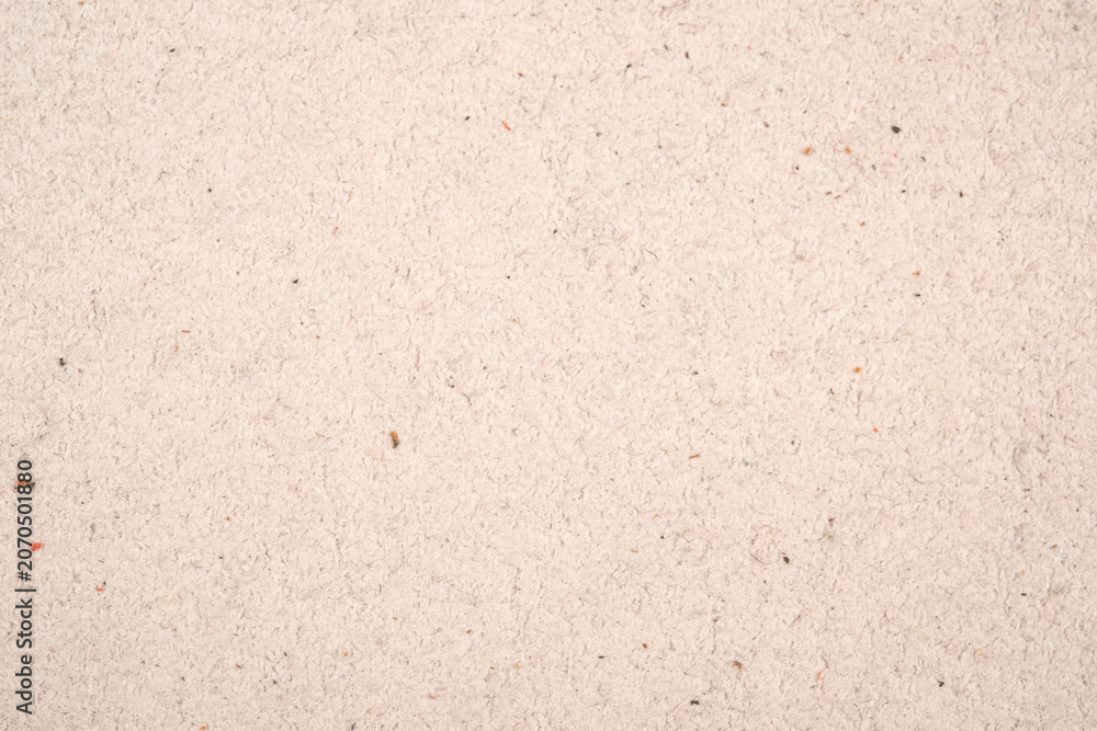 Fototapeta premium Close up texture of light beige suede leather surface with visible fiber details