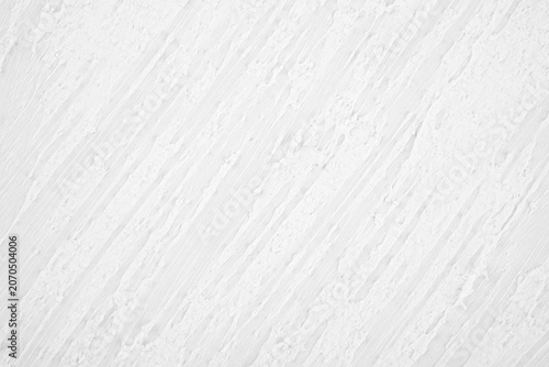 Textured white wall with diagonal brush strokes